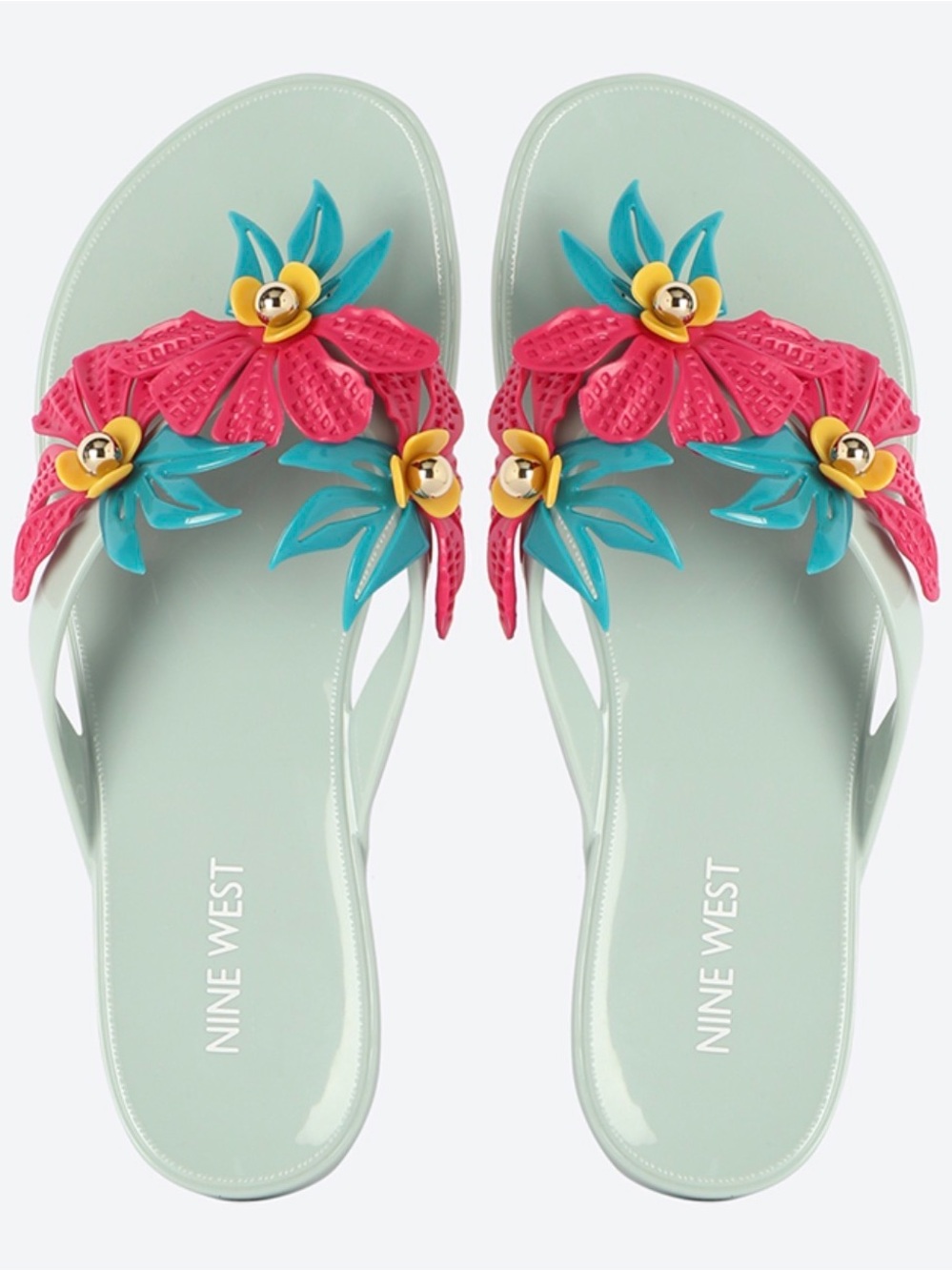 Nine West Macinee jelly flip-flop with vibrant pink & yellow 3D floral appliqué